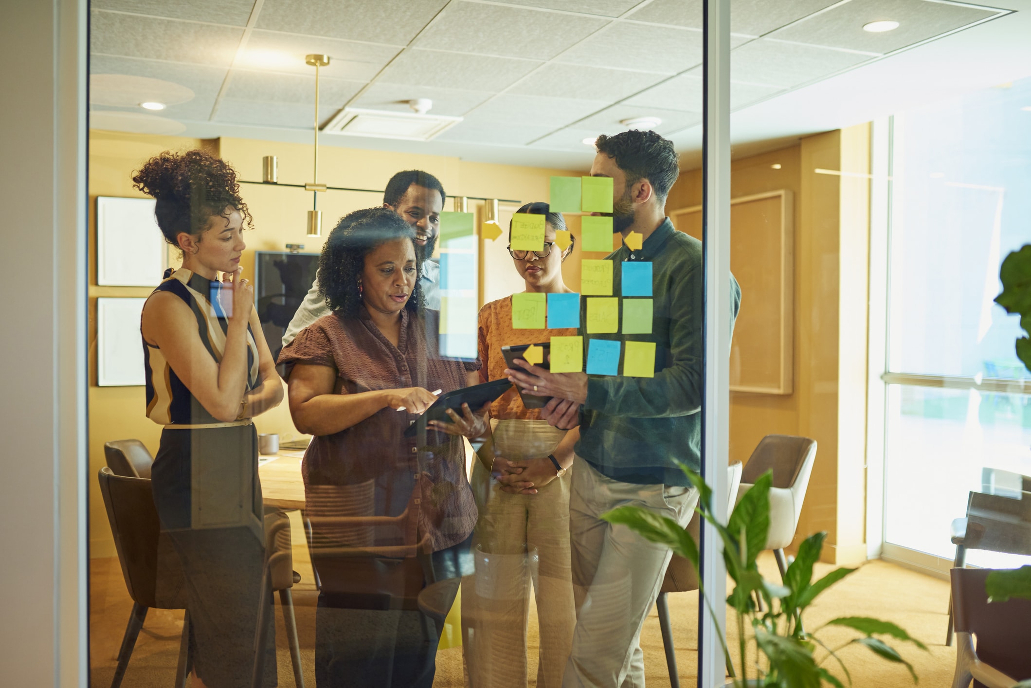 Group of people in a brainstorm in a modern office