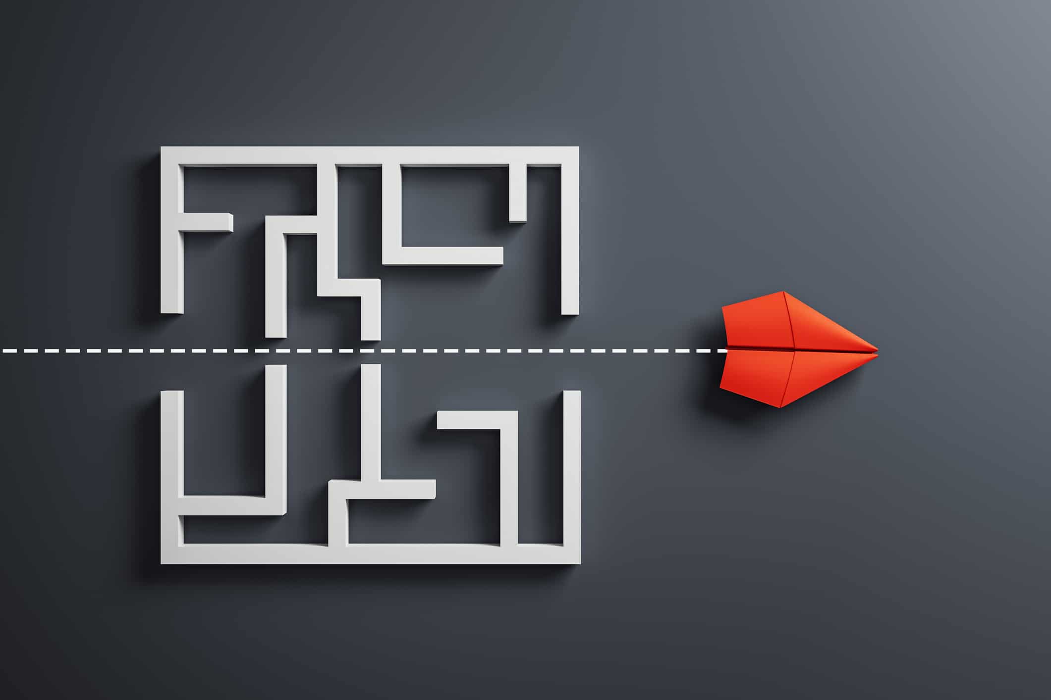 Dumbing it down is not the same as simplification: Red paper plane flying straight through maze with dotted path on dark background, symbolizing the simplification of the complex.